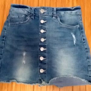 Tight jean skirt slight rips size 10-12 kids